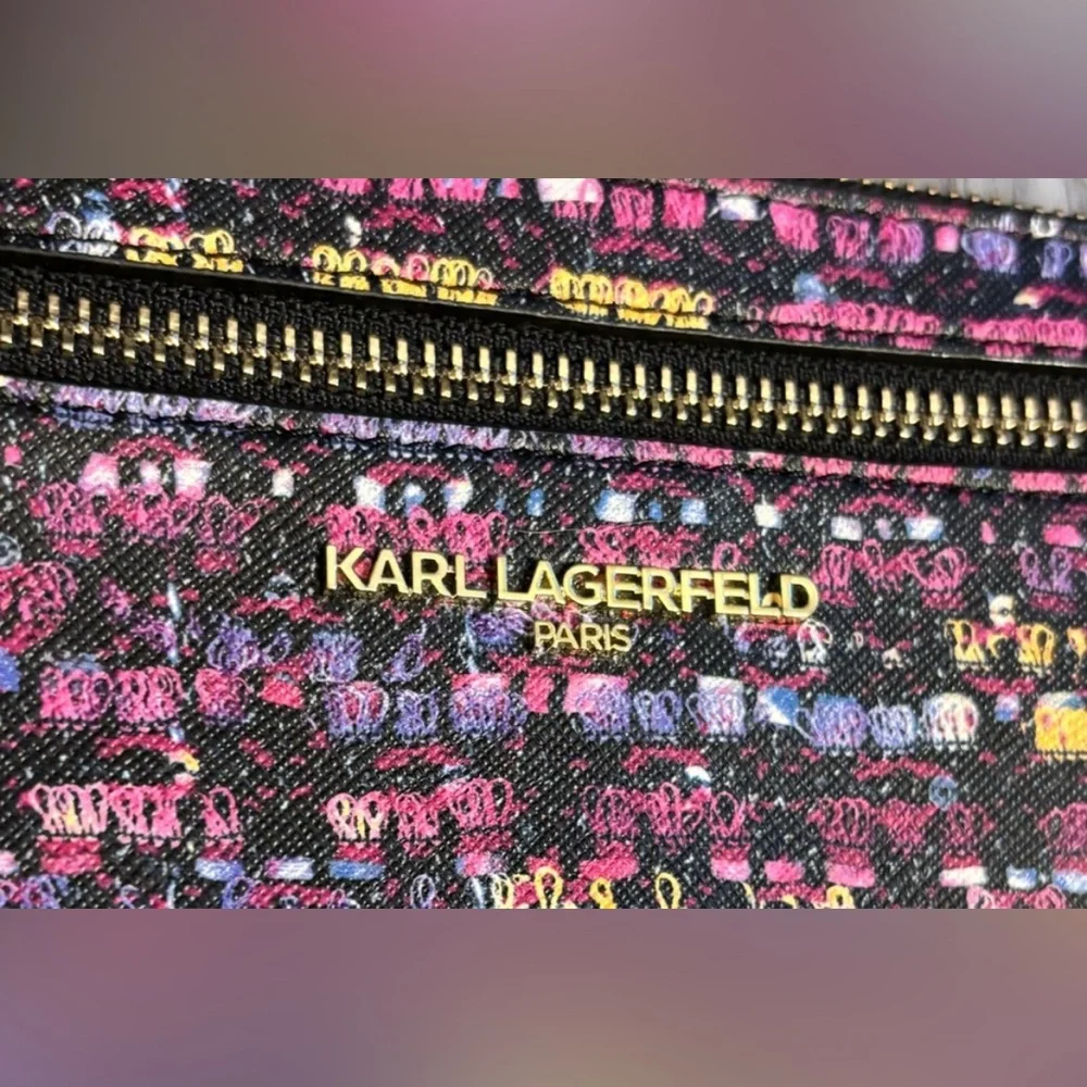 Karl Lagerfeld Paris Double Zip Wristlet Pouch Clutch in a plum combo print.